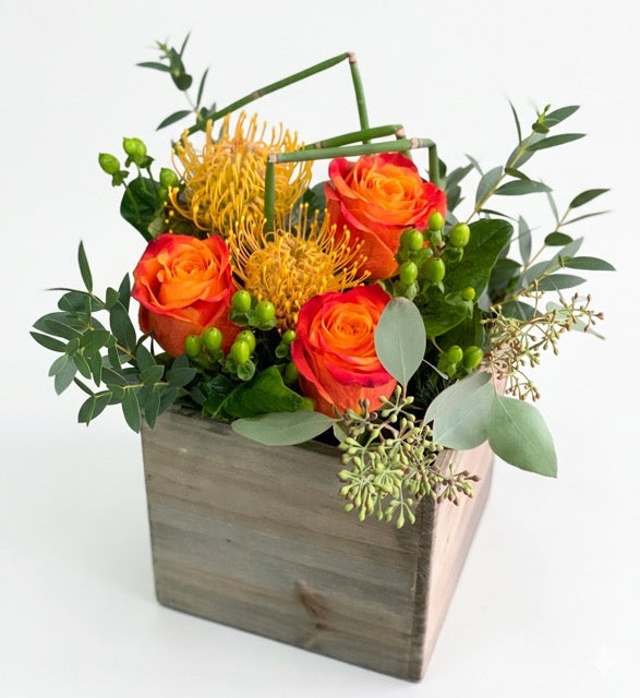 Rustic Sunset Floral Box – Vibrant Orange Roses & Pincushion Proteas